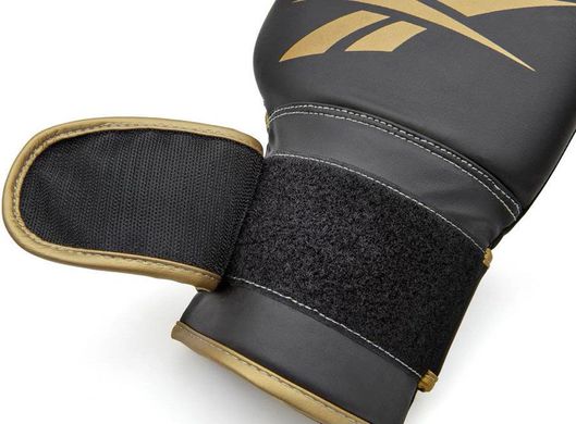 Боксерські рукавички Reebok Boxing Gloves чорний, золото Чол 12 унцій 00000026270