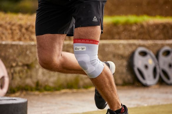 Фиксатор колена Reebok Speedwick Knee Support белый, красный Уни L RRSU-14325